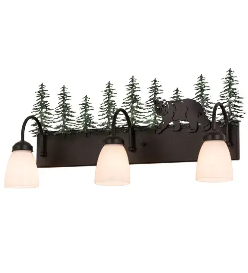 Drawing inspiration from the wildlife and natural beauty in the nearby Adirondack Mountains, this stunning lighting fixture depicts a majestic Bear wandering around the woodlands with a stand of tall pine trees in the background.Three White art glass shades project downward illumination and are complemented with a frame and hardware featured in a Textured Black finish and enhanced with handpainted Green Tree decorative accents. The fixture is ideal for illuminating baths as a vanity light or as a wall sconce in corridors and other rooms.The luminaire is handcrafted by skilled artisans in our Yorkville, NY facility. Custom designs, finishes, sizes and dimmable energy efficient lamping available. UL & cUL listed for dry and damp locations. Collection: Lone Bear Finish: Textured Black/Green Trees Glass: White Opal Glass Notes: Custom Crafted In Yorkville, New York Please Allow 30 Days Width: 27.00" Height: 13.25" Length: 8.00" Weight: 6.00 lb Extension from Wall: 8.00" Number of Bulbs: 3 Maximum Wattage: 60.00 W Bulb Type: A15 Bulb Base: E26 Material: Steel Country of Origin: USA Safety Listing: Damp Safety Rating: Damp - alternate view