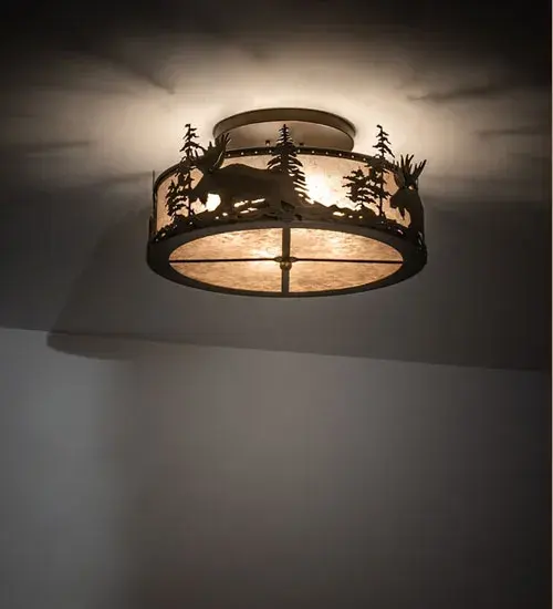 The mighty majestic Moose wanders past tall pine trees in the woods as the afternoon sun lowers in the background. Pleasant ambient light projects through Silver Mica for warm visual comfort. This striking wildlife inspired fixture is featured in an Antique Copper finish and handcrafted in the USA by Meyda artisans at the foothills of Upstate New York's Adirondack Mountains. Perfect for illuminating any room. Collection: Moose At Dusk Finish: Antique Copper Glass: Silver Mica Width: 23.50" Height: 10.50" Length: 23.50" Weight: 12.50 lb Extension from Wall: 10.50" Number of Bulbs: 4 Maximum Wattage: 60.00 W Bulb Type: A19 Bulb Base: E26 Material: Steel Country of Origin: USA Safety Listing: Damp Safety Rating: Damp