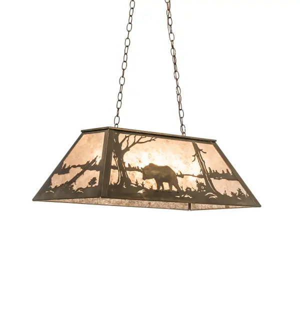 Drawing inspiration from the wildlife and natural beauty in the nearby Adirondack Mountains, this stunning lighting fixture depicts a majestic Bear wandering near the woodland lakes as the morning sun rises in the background. A warm ambient glow projects through Silver Mica, which is complemented with a frame and hardware featured in an Antique Copper finish. The pendant, which is perfect for illuminating islands, counters and billiard tables, is handcrafted by Meyda artisans in our Yorkville, NY facility.This image is an artist rendition and the actual fixture will deviate from the illustration shown. Please feel free to request drawings for customized designs as sizes, styles, finishes and dimmable energy efficient lamping options can be made to order. Collection: Bear At Lake Finish: Antique Copper Glass: Silver Mica Width: 17.00" Height: 18.00" Length: 33.00" Weight: 19.00 lb Extension from Wall: 17.00" Number of Bulbs: 6 Maximum Wattage: 60.00 W Bulb Type: A19 Bulb Base: E26 Material: Steel Country of Origin: USA Safety Listing: Dry Safety Rating: Damp