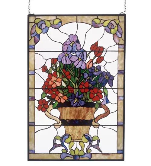 Spring Flowers of Lavender; Burgundy; Coral and Indigo adorn a handsome urn against a Clear Frost sky in this Elegant Meyda Tiffany original window. Handcrafted utilizing the copperfoil construction process and 390 pieces of stained art glass encased in a solid brass frame this window also comes with mounting bracket and jack chain.