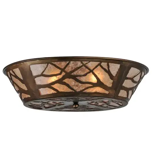 This attractive lighting design features silhouetted tree branches that appear like a mid-winter shadow from a crisp full moon and mesmerize with a striking look inspired by Mother Nature. The stunning Silver Mica lens is complemented with a frame and hardware featured in an Antique Copper finish. This gorgeous ceiling fixture perfectly complements any residential or commercial environment; especially in hallways and dining areas in timber frame homes; camps; and restaurant settings. The fixture is inspired by trees in the Monongahela Forest in West Virginia; the Shawnee National Forest in Illinois; and the Bridger-Teton Forest in Wyoming. The Branches Flushmount is included in our American-made; American-designed; handcrafted Nature Inspired Collection and manufactured in Yorkville; New York. UL and cUL listed for dry and damp locations.