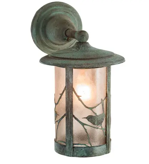 Branches with Song Bird silhouettes accent this handsome American Craftsman lantern style solid mount wall sconce. The fixture is finished in Verdigris and has Clear Seedy glass panels on its lens. Handcrafted in our 180;000 square foot manufacturing facility in Yorkville; New York. UL and cUL listed for dry; damp and wet locations. - alternate view