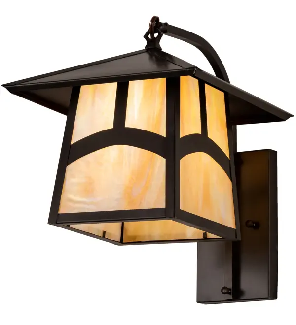 An Arts and Crafts Hill Top arched bar accents this handsome American Craftsman lantern style curved arm wall sconce. The fixture; handcrafted in the USA by Meyda artisans; is finished in Craftsman Brown and has Iridized Beige glass panels.