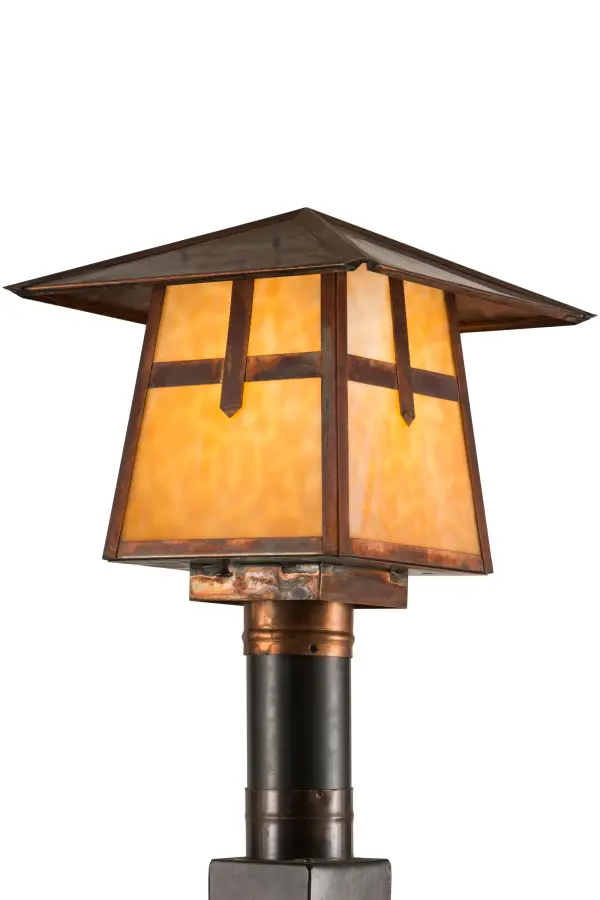The Cross Mission has Arts and Crafts style crossed bars that accents this handsome American Craftsman lantern style post mount. The fixture, handcrafted in the USA by Meyda artisans, is finished in Vintage Copper and has Beige glass panels. Collection: Stillwater Finish: Vintage Copper Glass: Beige Art Glass Width: 17.50" Height: 13.00" Length: 12.50" Weight: 7.00 lb Number of Bulbs: 1 Maximum Wattage: 60.00 W Bulb Type: A19 Bulb Base: E26 Material: Copper Country of Origin: USA Safety Listing: Wet Safety Rating: Wet