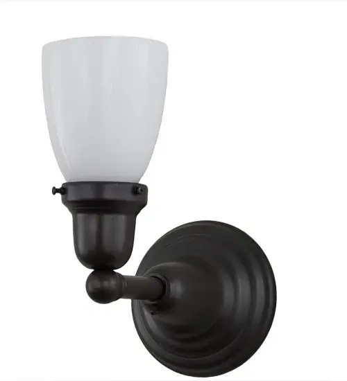 Capturing an era of style and charm from days gone by, Oyster Bay features a Goblet styled shade in Opal White blown-glass that is perched upon Solid Brass hardware. The fitting, arm and backplate are designed and crafted with the exact details of old world craftsmanship. Custom crafted in in Upstate New York, this American Revival fixture is designed with a handsome Craftsman Brown finish. The fixture is ideal for interiors and covered porch lighting applications. Custom sizes, styles and colors are available, as well as dimmable energy efficient lamping options. Collection: Revival Oyster Bay Finish: Craftsman Brown Glass: White Opal Glass Width: 5.50" Height: 10.00" Length: 9.00" Weight: 2.00 lb Extension from Wall: 9.00" Number of Bulbs: 1 Maximum Wattage: 60.00 W Bulb Type: CA10 Bulb Base: E26 Material: Brass Country of Origin: USA Safety Listing: Damp Safety Rating: Damp - alternate view