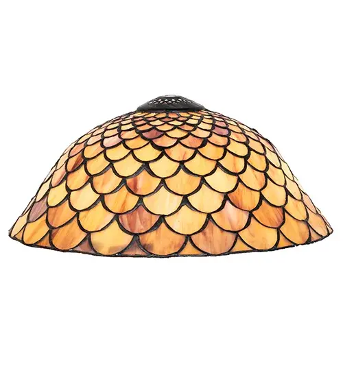 A Louis Comfort Tiffany studio classic... The renowned Fishscale design features a variegated Tortoiseshell of Emerald, Sapphire, Mauve, and Beige colored art glass, evoking a unique dimensional and textured look in a rainbow of brilliant hues. This exquisite art glass shade is created using the famous Meyda Tiffany copperfoil construction process and enhanced with a Mahogany Bronze finish. Inspired by Rainbow Trout and other colorful fish found in Northwest Montana, Eastern Idaho, and Baja, California. The shade can be paired with a base to create a table lamp or matched with hardware to build a ceiling fixture. The Tiffany Fishscale Shade is included in our American-designed Tiffany Reproduction Lighting Collection. Each shade is a unique work of art with color variations based on natural ingredients inherent in the glass. Collection: Tiffany Fishscale Glass: Stained Glass Width: 12.00" Height: 5.00" Length: 12.00" Weight: 3.50 lb Country of Origin: CHINA Safety Rating: Dry - alternate view