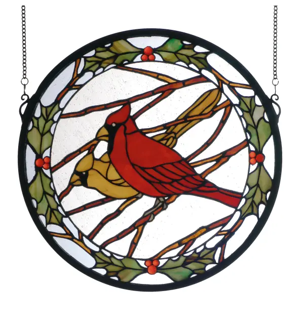 Scarlet Red cardinal with his Russet colored female companion adorn Bark Brown branches on Clear seedy glass. The brilliant winter friends are framed in a ring of Scarlet and Ever Green holly . Handcrafted utilizing the copperfoil construction process and 259 pieces of stained art glass and 12 jewel accents; encased in a solid brass frame. Mounting bracket and jack chain included.