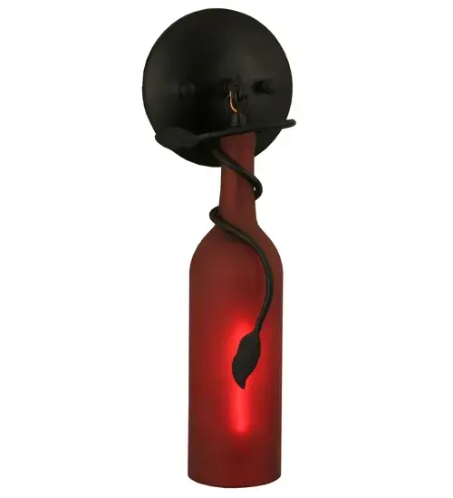 Capture the life of the party with the whimsical design of the Meyda Wine Bottle wall sconce. Liven up a restaurant; club; or home with a wall fixture that does so much more than deliver light; it adds personality and pizzazz. A Black finished wall plate with a Vine-like metal accent embraces a Frosted Red Glass Wine Bottle. Create a stunning design statement by installing this wall fixture in corridors and dining areas in homes; restaurants; hotels; pubs; nightclubs; and wineries; connoisseurs will appreciate this luminaire's fine detail and charm. This rich-looking Tuscan Vineyard Frosted Red Wine Bottle Wall Sconce is included in our American-made; American-designed; handcrafted Wine Bottle Lighting Collection. The fixture is manufactured in Yorkville; New York. UL and cUL listed for dry and damp locations. Take your finest bottle of wine; and Meyda will transform it into an everlasting personalized fixture of light. Contact us for more information on custom wine bottle lighting fixtures and lamps. We can also create custom lighting with beer bottles; mason jars; milk bottles; and other glass containers and vessels.? - alternate view