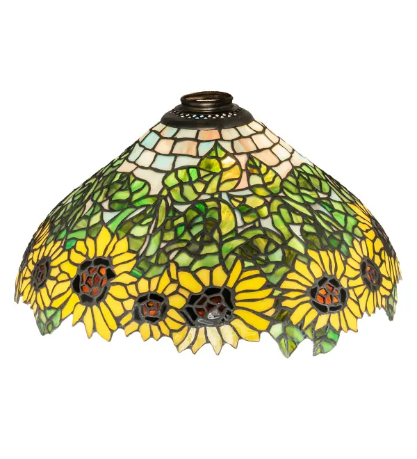 A field of sparkling Country Brown eyed; Farm Yellow sunflowers growing on stalks of summer Bronzed Green leaves; edge this Meyda original Tiffany style shade. The shade features a background of Sky Blue; Beige and Pink art glass tiles. Bring nature into your home with this hand cut and copper foiled stained glass pendant shade. The lovely shade can be paired with a base to create a table or floor lamp or matched with hardware to create a ceiling fixture. The Wild Sunflower Shade is included in our American designed handcrafted; Tiffany Stained Glass Collection. Each shade is a unique work of art with color variations based on natural ingredients inherent in the glass. Contact us if color matching is critical when ordering multiple items.