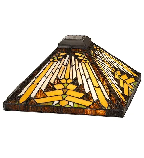 Like gazing out your window across the warm desert at sunset; interlocking tiles of Sand tone Beige glow behind the sun; glistening Orange; Amber Green; and Brown rays in art glass. A Root Brown border surrounds this stunning motif. The Nuevo Mission shade is created using the famous Meyda Tiffany copperfoil construction method. The shade is ideal for pairing with a base to create a table or floor lamp. Match the shade with hardware to create a beautiful ceiling fixture. The Nuevo Mission Shade is included in our American-designed; handmade Southwestern Stained Glass Series. Each shade is a unique work of art with color variations based on natural ingredients inherent in the glass. - alternate view