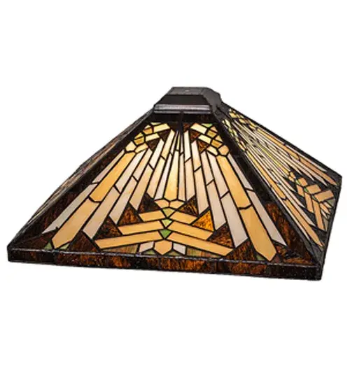 Like gazing out your window across the warm desert at sunset; interlocking tiles of Sand tone Beige glow behind the sun's glistening rays in Orange; Amber Green; and Brown art glass; a Bark Brown border surrounds this mesmerizing motif. The beautiful Nuevo Mission shade is created using the famous Meyda Tiffany copperfoil construction method. The shade is ideal for pairing with a base to create a table or floor lamp. Match the shade with hardware to create a beautiful ceiling fixture. The Nuevo II Shade is featured in our American-designed; handmade Southwestern Stained Glass Series. Each shade is a unique work of art with color variations based on natural ingredients inherent in the glass. - alternate view