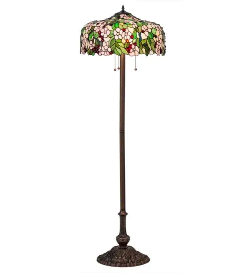 Cardinal Red jewel cherries glisten between Rosy Pink flowers and Verdant Green leaves in our version of the Tiffany Studio's cherry blossom. The cascading blooms and fruit form the undulating edge of this colorful and intricately patterned stained glass shade. This lovely shade rests on a Mahogany Bronze hand finished floor lamp base. - alternate view