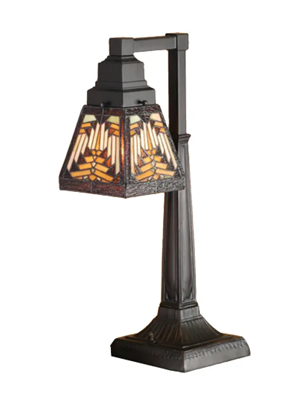 Warm earth toned Bone Beige and Moccasin Tan stained glass; accented with glistening Root Brown and Sage Green; is used to make this intricate interlocking patterned shade. A Mission style lamp base in a hand applied Mahogany Bronze finish supports the handsome square shade inspired by historic American artwork. Handcrafted with the copper foil technique developed by Louis Comfort Tiffany; this desk lamp is a true masterpiece.