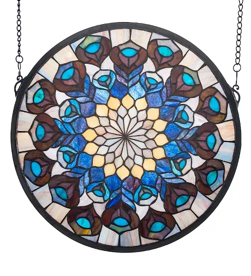 320 pieces of hand cut Teal; Royal Violet with Emerald and Ivory stained glass are used to make this regal Peacock Feather medallion window. Handcrafted utilizing the copperfoil construction process created by Tiffany; the window also comes with a solid brass hanging chain and brackets. - alternate view