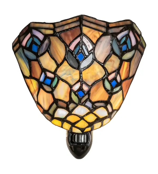 As distinctive as a beautiful Peacock's feathers, no two shades will ever be the same as their individuality can be as remarkably unique as their personality. This artistic creation utilizes swirling opalescent art glass background combinations including Beige Amber, Yellow Pinks, Red Purples, Golden Blues and Greens, Ivories, Bluish Whites, Turquoise Blues, Periwinkle, Olive and Spring Greens, Pale Yellow, Amethyst, Emerald and Topaz. The eye of the plumage design reveals Purples, Pastel Blues, Teals, Cobalt and Ivories. Individual pieces of glass are hand cut and wrapped using Meyda Tiffany's famous copperfoil construction. Each shade is a unique work of art with color variations based on natural ingredients inherent in the glass. Collection: Tiffany Peacock Feather Finish: Black Glass: Mauve/Beige/Pink/Orange/Blue/Purple Width: 5.50" Height: 5.50" Length: 2.50" Weight: 1.00 lb Number of Bulbs: 1 Maximum Wattage: 5.00 W Bulb Type: CA10 Bulb Base: E12 Material: Plastic Country of Origin: USA Safety Rating: Dry