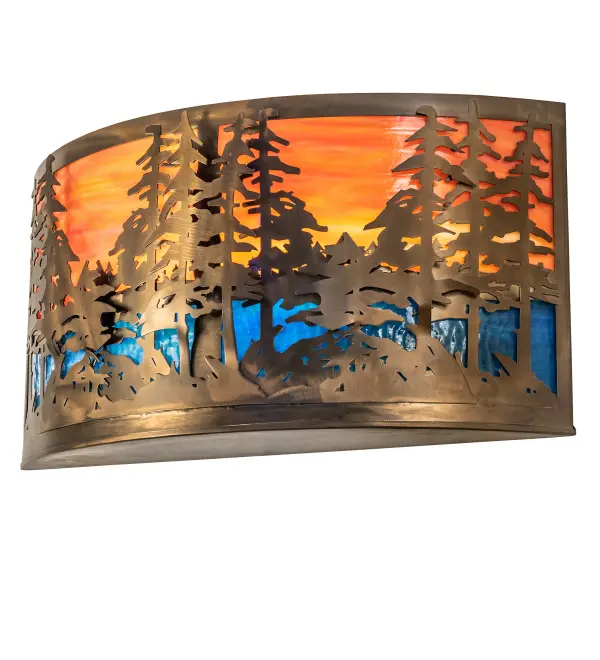 A stand of Tall Pines are depicted on this wall sconce handcrafted in the USA by Meyda artisans. This nature inspired fixture is finished in Antique Copper. Collection: Tall Pines Finish: Antique Copper Glass: Orange & Blue Green Art Glass Width: 24.00" Height: 12.25" Length: 7.00" Weight: 12.50 lb Extension from Wall: 7.00" Number of Bulbs: 2 Maximum Wattage: 60.00 W Bulb Type: A19 Bulb Base: E26 Material: Steel Country of Origin: USA Safety Listing: Damp Safety Rating: Damp