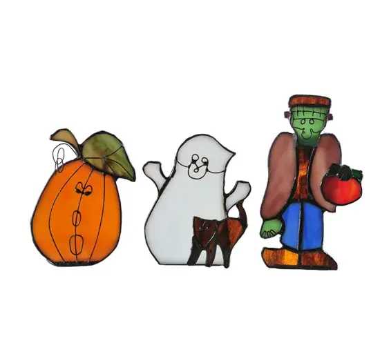 Add a festive spirit to your home during the October holiday with our adorable Halloween Tea Lights. Colorful stained glass home accents for Halloween and throughout the Autumn Season. These lighted figures depict a Friendly Pumpkin; a White Ghost with Black Cat; and Frankenstein. These three figures are handcrafted using the famous Meyda Tiffany copperfoil construction process. Ideal as illuminating accent pieces on mantels; credenzas; occasional tables; and other spaces throughout the US in residential and hospitality settings; from Salem; Massachusetts; to Sleepy Hollow; New York; to Transylvania; Romania. The 4.75" High Halloween 3 Pieces Tea Light Set is included in our American-designed; handcrafted Halloween Collection. UL and cUL listed for dry locations.