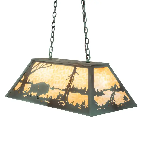Buffalo by a lake in the woods is depicted on an oblong pendant. This American Bison fixture is finished in Antique Copper; has Verdigris glass panels and is handcrafted in the USA by Meyda artisans. "