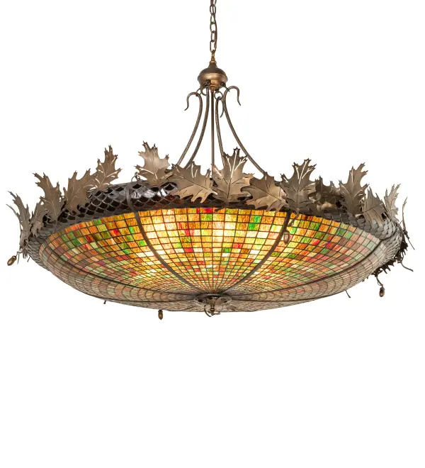 Majestic as the mighty oak is this leaf adorned pendant with an Antique Copper finish. A lighted stained glass shade in Multi-toned Autumn Green with a Bark Brown granite glass crown. Overall height ranges from 44 to 116 inches as the chain length can be easily adjusted in the field to accommodate your specific lighting application needs. The elegant hardware is handcrafted in our 180,000 square foot manufacturing facility in Yorkville, NY. Shade colors, metal finishes and fixture sizes can be customized. This fixture is UL and cUL listed for dry and damp locations. No two art glass shades will be the same as their individuality can be as remarkably unique as their personality. Collection: Greenbriar Oak Finish: Antique Copper Antique Copper Glass: Stained Glass Notes: Custom Crafted In Yorkville, New York Please Allow 30 Days Width: 52.00" Height: 39.00" Length: 52.00" Weight: 60.00 lb Number of Bulbs: 8 Maximum Wattage: 60.00 W Bulb Type: A19 Bulb Base: E26 Material: Steel Country of Origin: USA Safety Listing: Damp Safety Rating: Damp