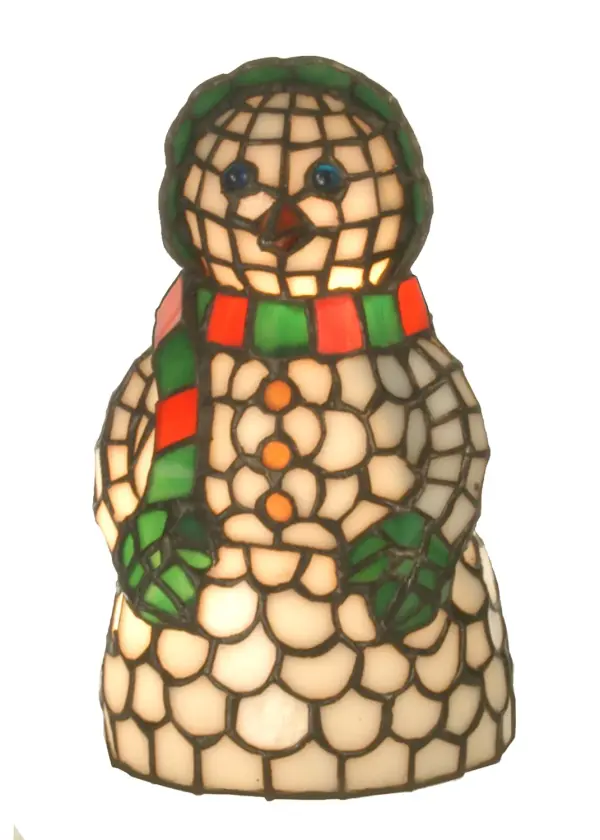Tis the season to display a wonderful decorative accent lamp designed as the wife of the greatest gift give of all time. The always warm and charming Mrs. Santa Claus is designed in a Christmas Red skirt with a Holiday Tree Green Shawl handcrafted of individual pieces of stained glass using Tiffany's famous copperfoil construction process. Warm your heart and holiday spirit with Mrs. Claus on tabletops, countertops and mantels Collection: Mrs. Claus Finish: Flame Green Ca Lt Peach Glass: Fl Ka Ca Phs Width: 4.50" Height: 10.00" Length: 4.50" Weight: 2.00 lb Extension from Wall: 8.00" Number of Bulbs: 1 Maximum Wattage: 15.00 W Bulb Type: B10 Bulb Base: E12 Material: Steel Country of Origin: CHINA Safety Listing: Dry Safety Rating: Dry