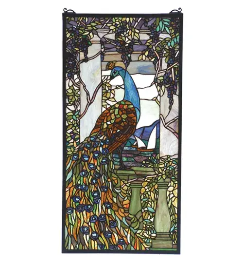 Louis Comfort Tiffany originally created this lovely Peacock window in the early 1800's. Meyda Tiffany has taken 1535 pieces of stained glass and painstakingly reproduced this window as close as possible to the original colors of Teal; Emerald; Amethyst and Jade. A solid brass hanging chain and brackets are included.