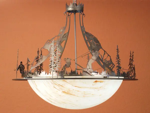 Winter Skiers slalom through snow covered mountins and pines on this inverted pendant. The fixture features Antique Copper finished hardware, which embrace a Sahara Taupe Idalight diffuser. The fixture is custom crafted in the USA. Custom colors, styles, sizes and dimmable energy efficient lamping options such as LED are available. The pendant is UL and cUL listed for dry and damp locations. Collection: Ski Adventure Finish: Antique Copper Glass: Sahara Taupe Width: 30.00" Height: 32.00" Length: 30.00" Weight: 22.00 lb Extension from Wall: 4.50" Number of Bulbs: 4 Maximum Wattage: 60.00 W Bulb Type: A19 Bulb Base: E26 Light Source: CFL Material: Steel Country of Origin: USA Safety Listing: Damp Safety Rating: Damp