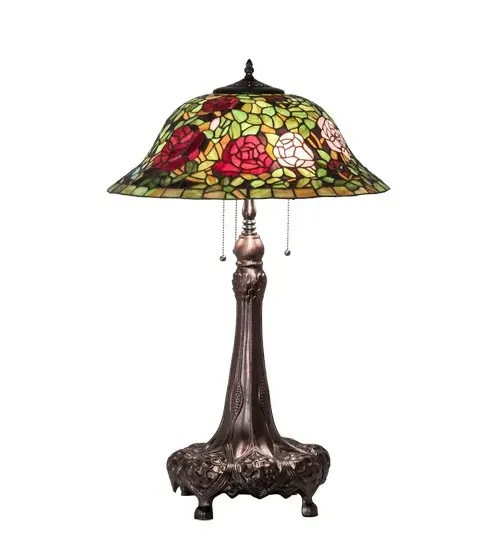 The most beloved of all floral beauties. The Rosebush is beautifully represented in this stunning reproduction of a Tiffany Studio Classic. Petal Pink; Romantic Red and Plum Passion art glass Roses ramble on a maze of Garden Green leaves. The shade is created using the famous Meyda Tiffany copperfoil construction. The delicate domed stained glass shade is paired with a Mahogany Bronze finished lamp base. UL and cUL listed for dry locations. - alternate view