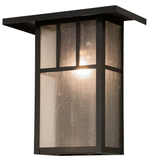 Double T bars adorn this handsome American Craftsman lantern style wall sconce. The fixture; handcrafted in the USA by Meyda artisans; is finished in Craftsman Brown and has Clear Seedy glass panels. - alternate view