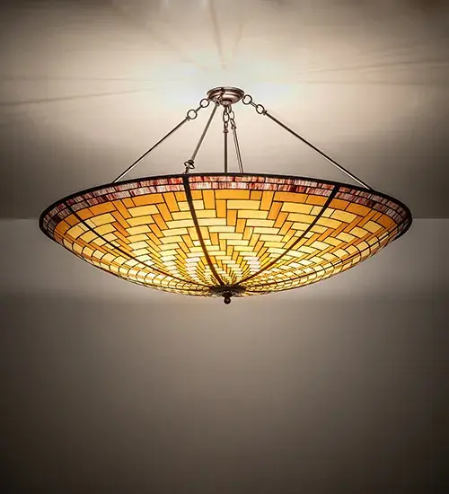 The perfect centerpiece for any room; this unique ceiling fixture features a stunning Honey and Beige colored Basket Weave stained glass patterned shade. Produced using Meyda Tiffany's famous copperfoil construction; this lovely pendant is trimmed with Burgundy art glass. To complement this striking shade; the canopy and hardware are hand finished in a handsome Mahogany Bronze. Custom sizes; colors and styles are available; as well as dimmable energy efficient lamping options. The fixture is UL and cUL listed for damp and dry locations.