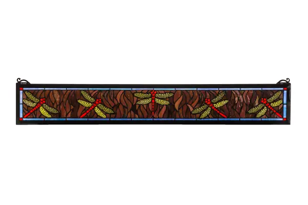 Five Scarlet Dragonflies with Ruby eyes and filigree wings dive playfully against a cloud filled Aurora Midnight sky streaked with a full spectrum of colors. The exceptional stained art glass used in this family has unique tones in each piece; just as in nature. Each piece of glass is hand cut and copper foiled in the Tiffany tradition. The window is encased in a solid brass frame and brass mounting bracket and chains are included.