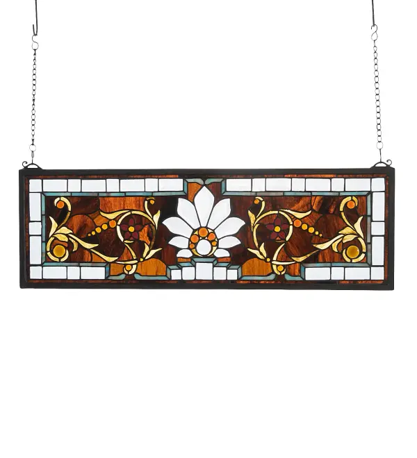 In the Tiffany tradition; 45 pieces of Clear beveled glass and 27 Amber glass jewels are combined with Bronze and Sky Blue stained art glass to create this beautiful floral transom. Handcrafted utilizing the copperfoil construction process; the window also comes with a solid brass hanging chain and brackets.