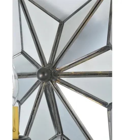 Like wishing upon a magical star; this decorative wall sconce is inspired by starlights originally believed to bring good luck to European homes hundreds of years ago. This unique wall fixture features a Star-styled Mirrored glass shade with a reflective coating illuminated by a White faux candlelight. This stunning shade is complemented with an Oil Rubbed Bronze finish. The Mirrored Star Wall Sconce is included in our American-made; American-designed; handcrafted Moravian Star Collection and manufactured in Yorkville; New York. UL and cUL listed for damp and dry locations. - alternate view