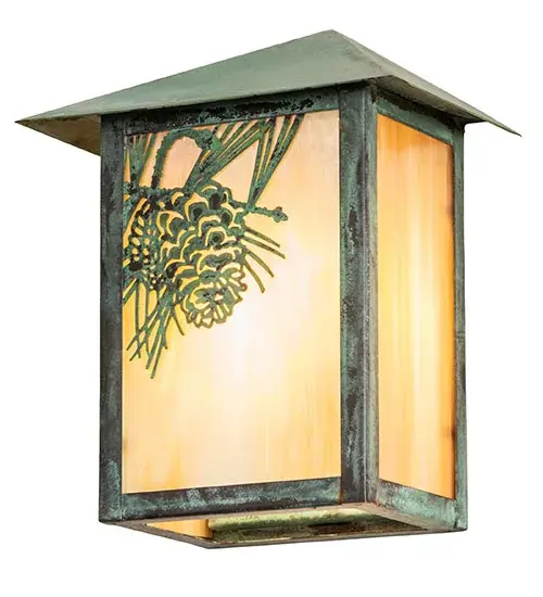 A Winter Pinecone with Pine Needles delicately etched of Solid Brass. Rustic charm comes alive with soft ambient light projected through a stunning Beige Iridescent Glass diffuser. The Nature Inspired wall sconce is complemented with Verdigris finished hardware. This Craftsman Signature fixture is ideal for both exterior and interior lighting applications. Handcrafted by highly skilled artisans in our 180,000 square foot manufacturing facility in Yorkville, New York. Diffuser colors, metal finishes and fixture sizes can be customized to your needs. UL and cUL listed for dry, damp and wet locations. Collection: Seneca Finish: Verdigris Glass: Beige Iridescent Glass Width: 6.50" Height: 8.50" Length: 4.50" Weight: 2.00 lb Extension from Wall: 4.50" Number of Bulbs: 1 Maximum Wattage: 60.00 W Bulb Type: A19 Bulb Base: E26 Material: Brass Country of Origin: USA Safety Listing: Wet Safety Rating: Wet - alternate view