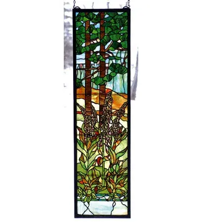 This nature inspired Foxglove window was originally designed by the L. C. Tiffany Studio. Meyda craftsmen and Artists have painstakingly reproduced it with colors of Emerald and Willow Greens, Forrest Browns, Mauves and Sky Blue. 824 pieces of hand cut and copper foiled glass are used to create this striking window. A solid brass hanging chain and brackets are included. Collection: Tiffany Foxgloves Finish: Green/Blue Lt Peach Amber Green Glass: Jp Phs Xa Ka Width: 12.00" Height: 44.00" Length: 12.00" Weight: 12.00 lb Bulb Type: TBD Material: Metal Or Polyresin Country of Origin: CHINA Safety Listing: Dry Safety Rating: Dry