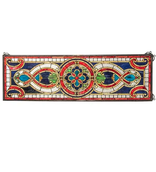 513 pieces of hand cut stained glass and 10 jewels are used to make this elegant stained glass window; which features a floral medallion flanked with translucent figure eights and bordered in matching glass. Lapis; Moss and Burgundy are the prime colors of this Tiffany style window. This exquisite piece can be used as a transom window for placement above or adjacent to a door or window or in other areas of a home or business. This window is created using the famous Meyda Tiffany copperfoil construction. A Solid Brass hanging chain and brackets are included.