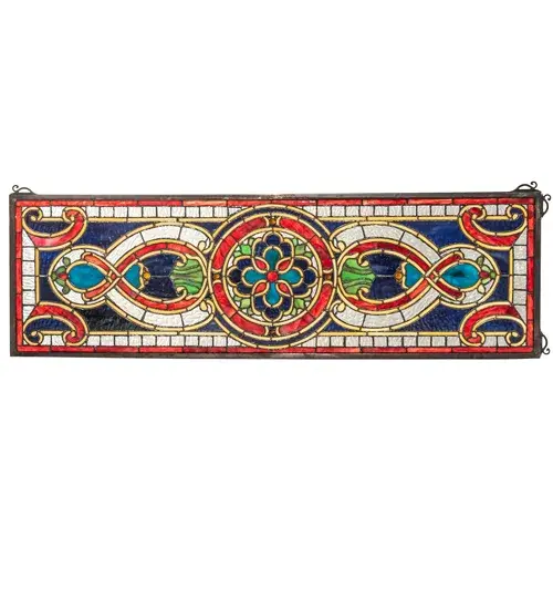 513 pieces of hand cut stained glass and 10 jewels are used to make this elegant stained glass window; which features a floral medallion flanked with translucent figure eights and bordered in matching glass. Lapis; Moss and Burgundy are the prime colors of this Tiffany style window. This exquisite piece can be used as a transom window for placement above or adjacent to a door or window or in other areas of a home or business. This window is created using the famous Meyda Tiffany copperfoil construction. A Solid Brass hanging chain and brackets are included. - alternate view