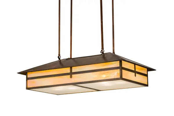 Custom crafted of Solid Brass; this Craftsman Signature pendant features Beige Iridescent art glass with a White glass bottom diffuser. The shade is enhanced with decorative accents and hardware featured in a handsome Vintage Copper finish. Place this pendant over an island; counter; billiard or dining table for an appealing design statement. Custom crafted by the hands of Meyda artisans in Yorkville; New York; this fixture is offered in custom colors; styles and sizes as well as dimmable energy efficient lamping options such as LED. The pendant is UL and cUL listed for damp and dry locations.