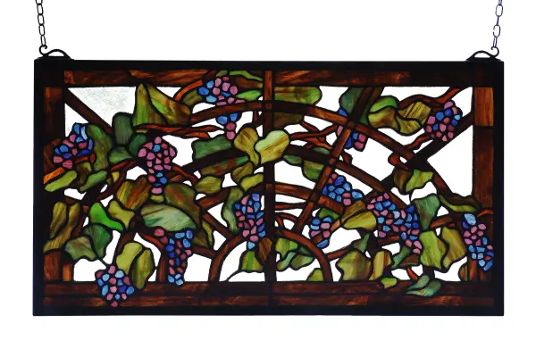 Radiant Concord Purple jewels with Vineyard Green leaves and glistening dew kissed Bark Brown vines on a Golden arbor accent a Crystalline glass background. 490 pieces of hand cut stained glass; bring sunny vineyards into home with this lovely hand crafted Meyda Tiffany original window. A solid brass hanging bracket and chains are included.
