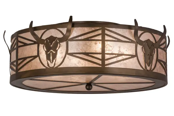 A longhorn steer skull and Native pattern accent this Western inspired flushmount. The fixture is finished in Antique Copper; has Silver mica panels; and is handcrafted in the USA by Meyda artisans.