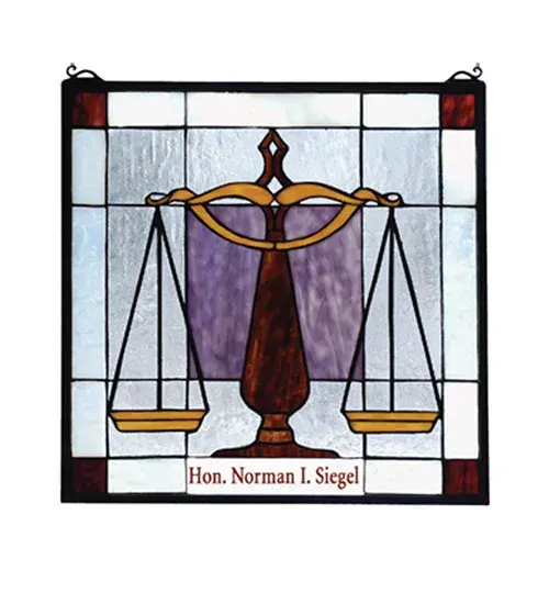 This exquisite personalized stained glass window features the Scale of Justice; a symbol for law in the United States. A Honey Wispy glass scale is featured with a Rootbeer Base on Purple Opalescent glass. The design is surrounded by Clear Seeded Glass with a White background. The four corners displays Deep Burgundy glass panels. The stunning glass design is complemented with a Mahogany Bronze finished frame. This window was personalized for the Honorable Norman I. Siegel. It is not for sale as is but can be customized to fit your personal needs with your family name or business logo.
