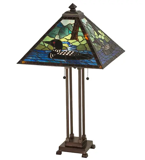A stunning image of an aquatic bird floating on a lake near the woodlands is captured in Blue Ripple Glass against a landscape of various Green colors with a Bark Brown Ripple Glass tree to match the shade's border. This wildlife inspired shade was created using the famous Meyda copperfoil construction process and is complemented with a handsome Mission styled based featured in a Mahogany Bronze finish. Custom colors; styles and sizes are available; as well as dimmable; energy efficient lamping options. The lamp is UL and cUL listed. - alternate view