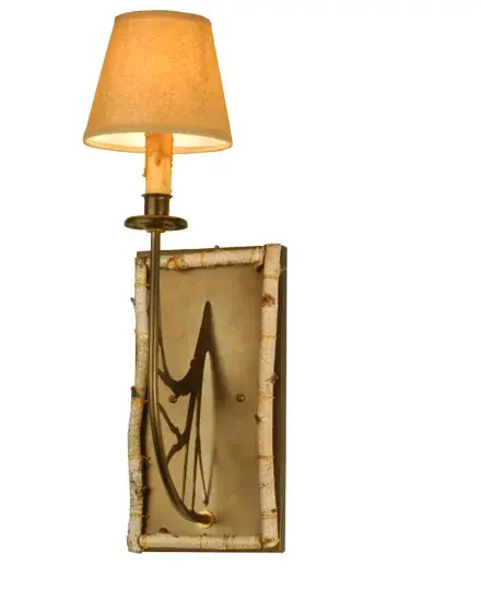Every Meyda Tiffany item is a unique handcrafted work of art. Natural variations in the wide array of materials that we use to create each Meyda product make every item a masterpiece of its own. Photographs are a general representation of the product. Colors and designs will vary. Collection: Birchwood Finish: Antique Copper Glass: Parchment Notes: Simple Paper Shade Width: 6.00" Height: 17.00" Length: 8.50" Extension from Wall: 8.50" Number of Bulbs: 1 Maximum Wattage: 40.00 W Bulb Type: B10 Bulb Base: E12 Material: Steel Country of Origin: USA Safety Listing: Dry Safety Rating: Dry