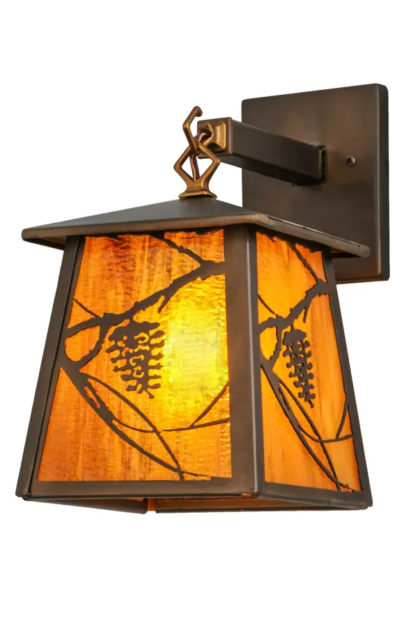 Listen closely. You can almost hear the soft whisper of the pine branches as they dance in the wind. Enjoy the warm ambiance of soft beautiful light diffused through Honey Wispy glass, which is highlighted with stunning pinecone and pine branch designs. The hardware is featured in a handsome Antique Copper finish and the fixture is handcrafted by Meyda Artisans in Yorkville, New York, at the foothills of the majestic Adirondack Mountains in the USA. Create the colors, size and style of your choice. Dimmable energy efficient lamping options are available. Collection: Whispering Pines Finish: Antique Copper Glass: Honey Amber Art Glass Width: 7.00" Height: 12.50" Length: 11.00" Weight: 6.00 lb Extension from Wall: 11.00" Number of Bulbs: 1 Maximum Wattage: 60.00 W Bulb Type: A19 Bulb Base: E26 Material: Steel Country of Origin: USA Safety Listing: Damp Safety Rating: Damp