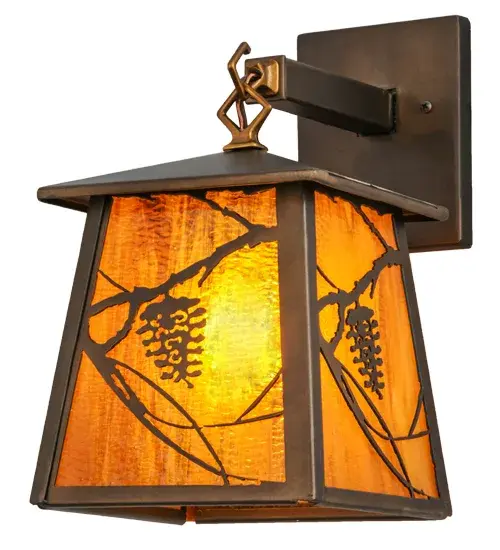 Listen closely. You can almost hear the soft whisper of the pine branches as they dance in the wind. Enjoy the warm ambiance of soft beautiful light diffused through Honey Wispy glass, which is highlighted with stunning pinecone and pine branch designs. The hardware is featured in a handsome Antique Copper finish and the fixture is handcrafted by Meyda Artisans in Yorkville, New York, at the foothills of the majestic Adirondack Mountains in the USA. Create the colors, size and style of your choice. Dimmable energy efficient lamping options are available. Collection: Whispering Pines Finish: Antique Copper Glass: Honey Amber Art Glass Width: 7.00" Height: 12.50" Length: 11.00" Weight: 6.00 lb Extension from Wall: 11.00" Number of Bulbs: 1 Maximum Wattage: 60.00 W Bulb Type: A19 Bulb Base: E26 Material: Steel Country of Origin: USA Safety Listing: Damp Safety Rating: Damp - alternate view
