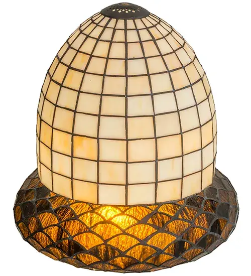 Inspired by the hues and textures of an Acorn, the seed of the mighty Oak Tree. This art glass shade is featured in Autumn Beige and crowned with a scalloped trim in Bark Brown Granite Glass. The beautiful shade is created using the famous Meyda Tiffany copperfoil construction and pairs well with a base to create a table lamp or matched with hardware to make a wall sconce or ceiling fixture. The Acorn Wall Sconce is included in our American designed, handcrafted Nature Inspired Stained Glass Collection. Each shade is a unique work of art with color variations based on natural ingredients inherent in the glass. Collection: Acorn Glass: Stained Glass Width: 12.00" Height: 13.00" Length: 12.00" Weight: 5.50 lb Country of Origin: CHINA Safety Rating: Damp - alternate view