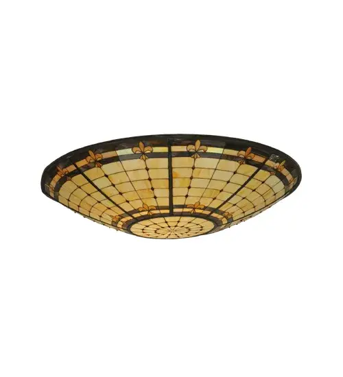An original Meyda Tiffany design. This curvaceous Fleur-de-Lite art glass shade is an elegant design featuring Golden stylized three-petaled irises with Amber colored jewels. A multi-colored band of Blues; Purples; and Greens is featured on a Beige background. The shade pairs well with hardware to build beautiful ceiling fixtures that can be used to illuminate islands and tables in fine homes and restaurants from Saratoga Springs; New York; to Fishers; Indiana; to Redmond; Washington; The Fleur-de-Lite Shade is featured in our American designed; handcrafted Stained Glass Lighting Collection. Each shade is a unique work of art with color variations based on natural ingredients. - alternate view