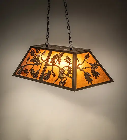 Rustic charm is revealed with this nature inspired lighting design as stunning Oak Leaves and Acorns flourish from branches that adorn this Amber Mica diffuser and appear to grow outward to reach towards the sun-filled sky. The shade is complemented with accents; frame and hardware featured in an Antique Copper finish.The most powerful of all trees; the mighty Oak represents courage and strength.This oblong pendant is perfect for illuminating kitchen islands; counters; dining tables and other areas.The fixture is handcrafted in our facility at the foothills of the Adirondack Mountains in the USA.Dimmable energy efficient lamping options are available; as well as custom sizes; styles and colors; are available.The fixture is UL and cUL listed for damp and dry locations.