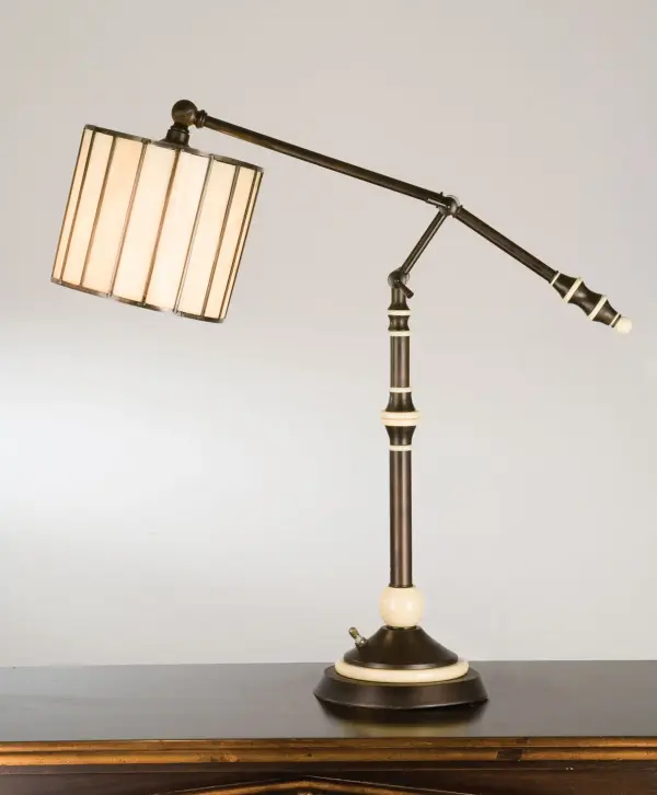 David Landis, renowned designer, takes copperfoiled stained glass a step beyond the ordinary. This classic modern architectural swing arm desk lamp, with Beige glass and Mahogany Bronze finish was designed for today's lifestyle. Collection: Revolution Finish: Mahogany Bronze Glass: Ba Width: 7.00" Height: 24.00" Length: 12.00" Number of Bulbs: 1 Maximum Wattage: 60.00 W Bulb Base: Medium