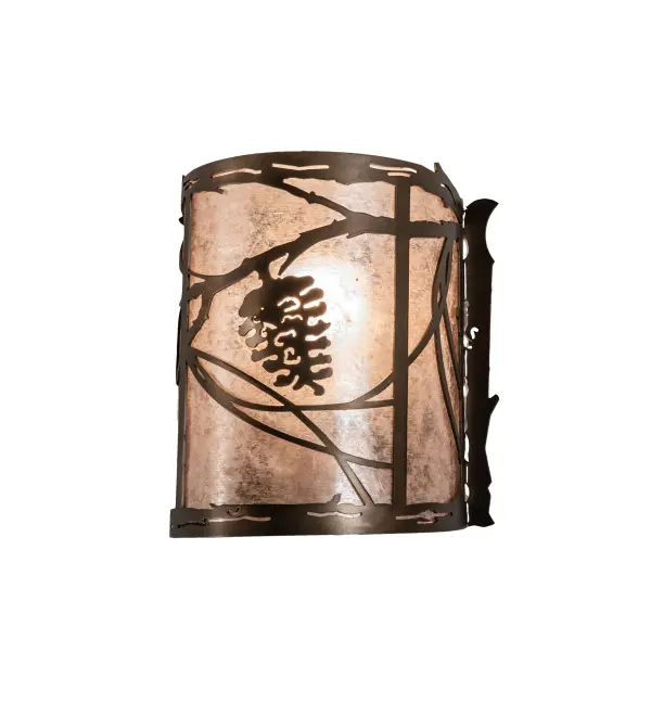 Listen closely. You can almost hear the soft whisper of the pinecone and pine branches as they dance in the wind. Soft beautiful light is diffused through Silver Mica which is enhanced with an Antique Copper finish. The sconce is handcrafted by Meyda Artisans in Yorkville; New York at the foothills of the Adirondack Mountains.