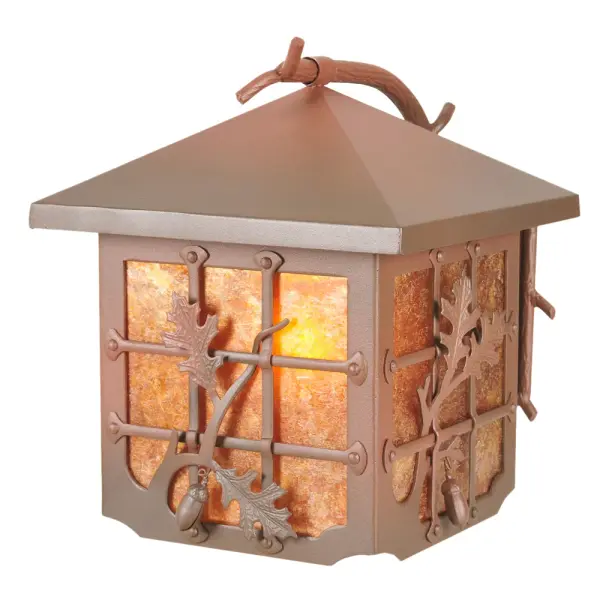 Rustic charm is revealed with this Nature-inspired lighting design as stunning Oak Leaves and Acorns flourish from metal branches that adorn an Amber Mica lens. The hanging wall sconce is complemented by accents; a frame; and hardware in a Rust-on-Wrought Iron finish. The most powerful of all trees; the mighty Oak represents courage and strength. The lantern-style wall fixture is ideal for illuminating hallways and dining areas in residential and hospitality locations. The Oak Leaf & Acorn Curved Arm Wall Sconce is featured in our American-made; American-designed handcrafted Nature Inspired Collection and is manufactured in Yorkville; New York. The fixture is UL and cUL listed for dry and damp locations.